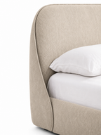 The Norvella Bed — Luxury Curved Upholstered Bed with Signature Strap Detailing